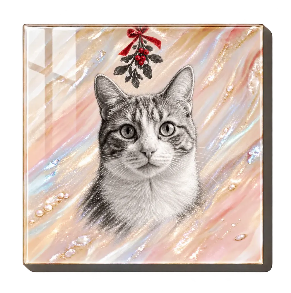 A pearl resin panel with a soft black-and-white portrait of a cat under a sprig of mistletoe