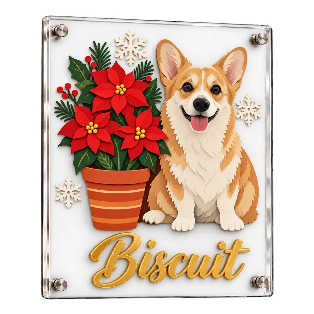 A clear acrylic plaque with a corgi built up in layers of cut glass, and Biscuit in raised gold script